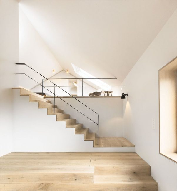 Modern staircase in the attic area