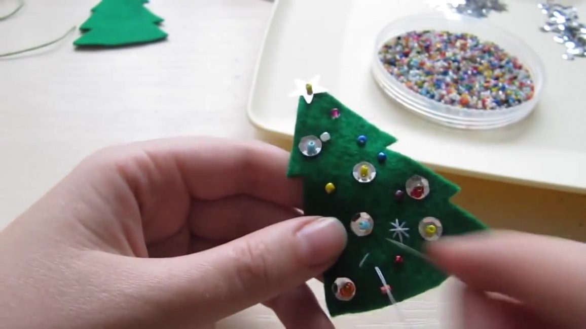 Decorate the front of the toy with sequins.