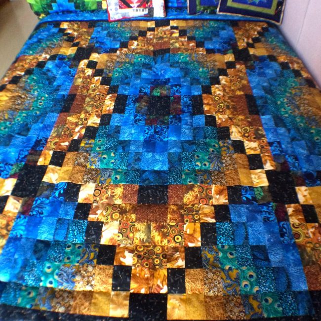 Bright quilt over the bed for comfort