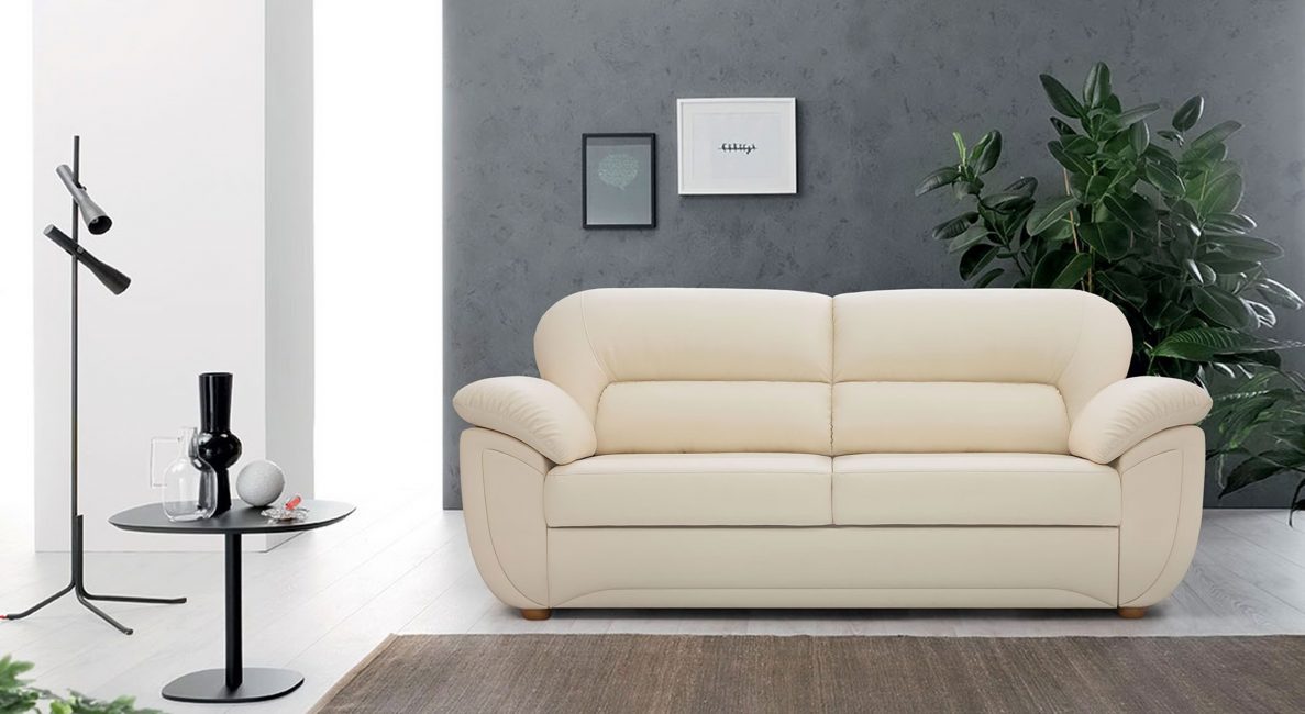 Leather sofa in beige color