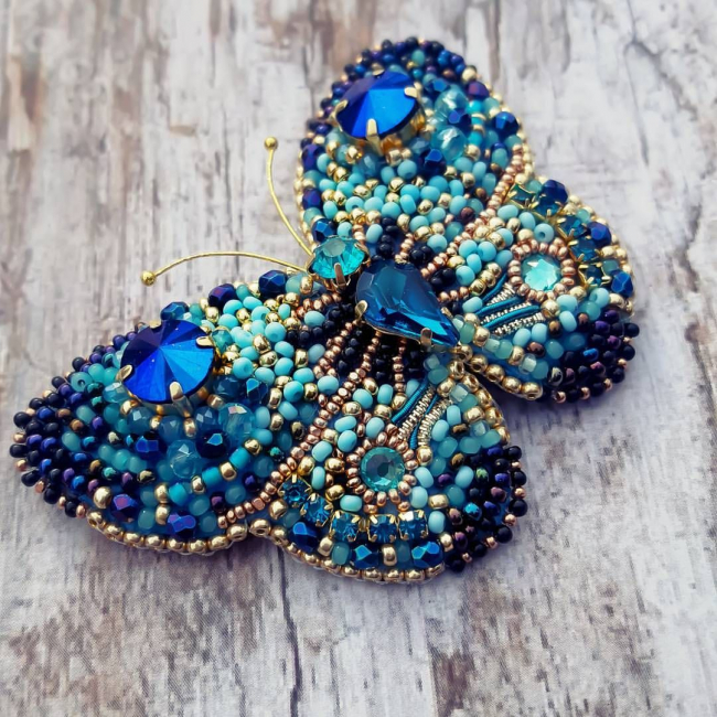 Blue butterfly brooch