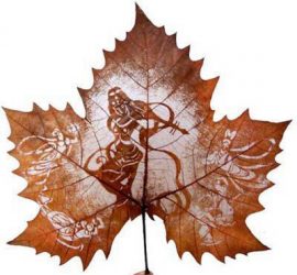 Handicraft of leaves on a sheet of paper The hands. What you need to know to create a beautiful application