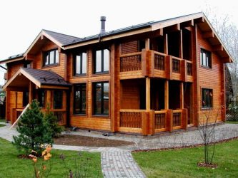 Projects of one-storey houses from a bar: Rules of registration, advantages and disadvantages