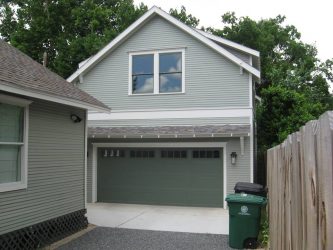 Huis met twee verdiepingen met een garage - Kenmerken van de lay-out (180+ foto's)