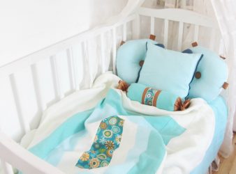 Kvaliteten på sängkläder i spjälsängen för nyfödda - Nyckeln till en hälsosam baby sova