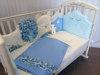 Kvaliteten på sängkläder i spjälsängen för nyfödda - Nyckeln till en hälsosam baby sova