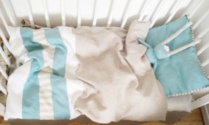 Die Qualität der Bettwäsche in der Wiege für Neugeborene - Der Schlüssel für ein gesundes Baby